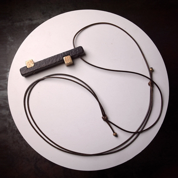 Hand-Chiseled Ebony Totem with Hammered Brass Accents