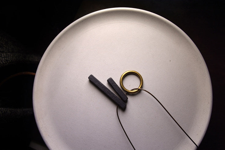 Hand-Chiseled Ebony "Orb" Pendant with Brass Filament