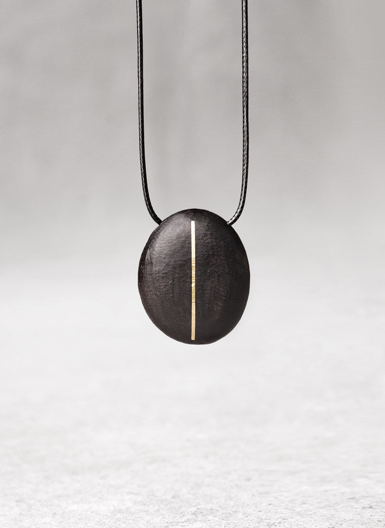 Hand-Chiseled Ebony "Orb" Pendant with Brass Filament