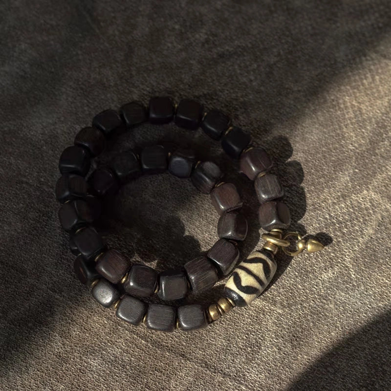 Double Tiger-Tooth Dzi & Ebony Bracelet for Protection & Royal Energy