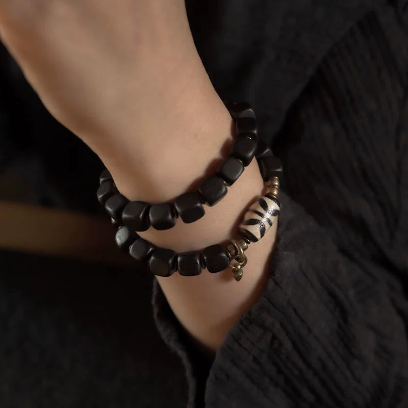 Double Tiger-Tooth Dzi & Ebony Bracelet for Protection & Royal Energy