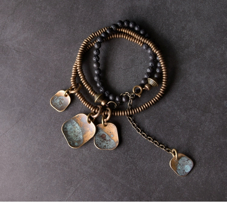 Unisex Lava Stone & Brass Coil Bracelet - Strength & Confidence