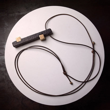 Hand-Chiseled Ebony Totem with Hammered Brass Accents