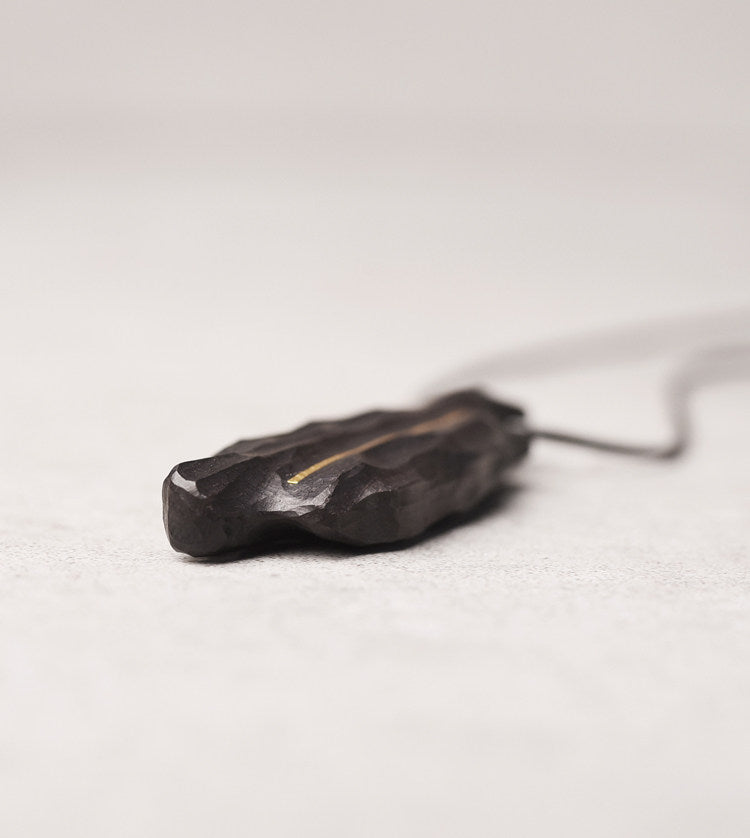 Artisan Chiseled Ebony Totem with Vertical Brass Inlay
