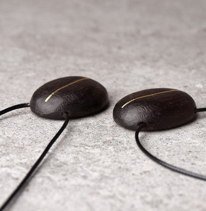 Hand-Chiseled Ebony "Orb" Pendant with Brass Filament
