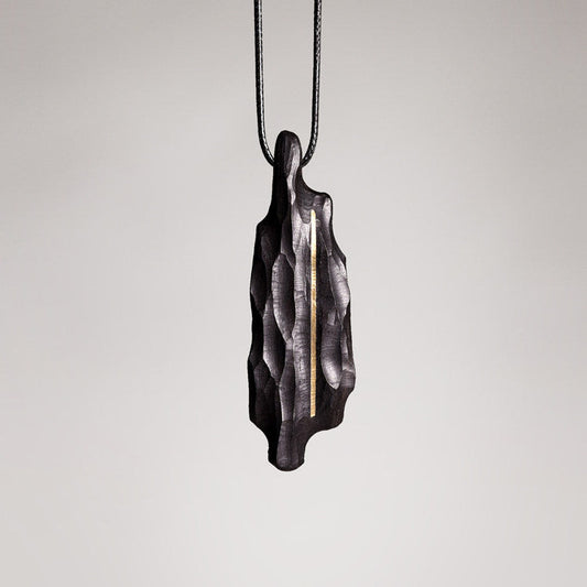 Artisan Chiseled Ebony Totem with Vertical Brass Inlay