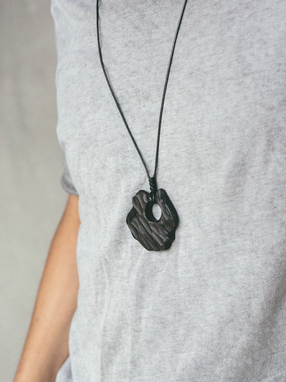 Artisan Chiseled Ebony "Ether" Disc Pendant