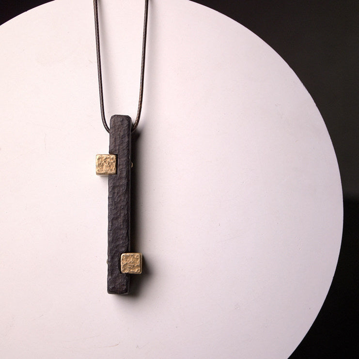 Hand-Chiseled Ebony Totem with Hammered Brass Accents