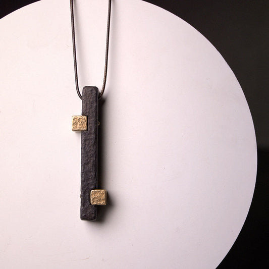 Hand-Chiseled Ebony Totem with Hammered Brass Accents