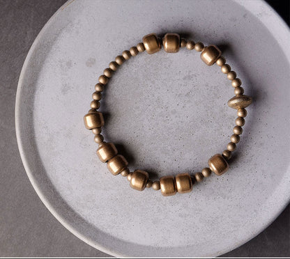 Antique Distressed Brass Beaded Bracelet with Sliding 8mm Cylinders