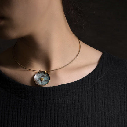 "Orb of Origin" Patina Brass Necklace