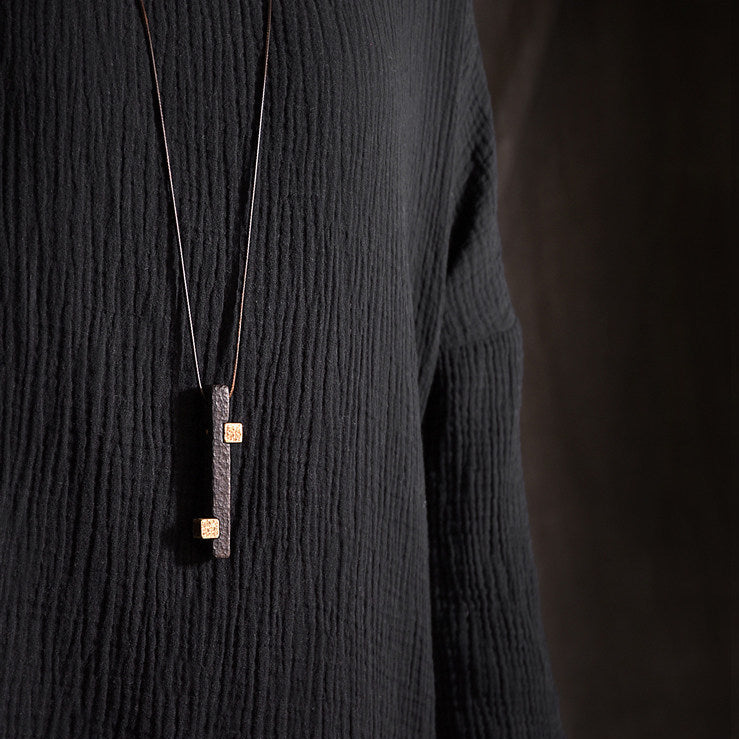 Hand-Chiseled Ebony Totem with Hammered Brass Accents