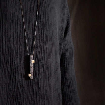 Hand-Chiseled Ebony Totem with Hammered Brass Accents