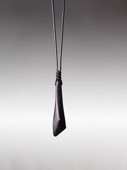Hand-Polished Ebony Spear Pendant with Brass Inlays