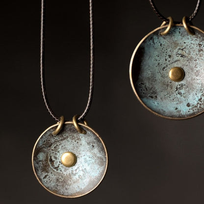 "Orb of Origin" Patina Brass Necklace