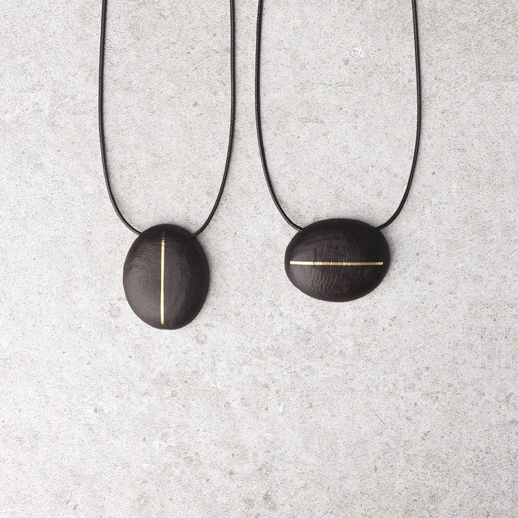 Hand-Chiseled Ebony "Orb" Pendant with Brass Filament
