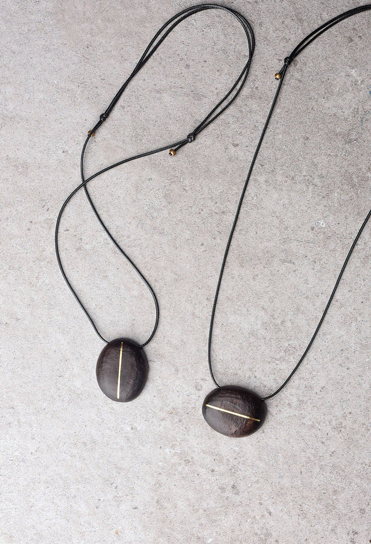 Hand-Chiseled Ebony "Orb" Pendant with Brass Filament
