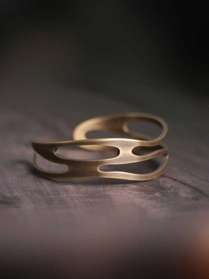Artisan Hollow-Out "Eternal Wave" Brass Cuff Bracelet