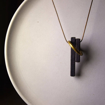 Hand-Chiseled Ebony "Orb" Pendant with Brass Filament