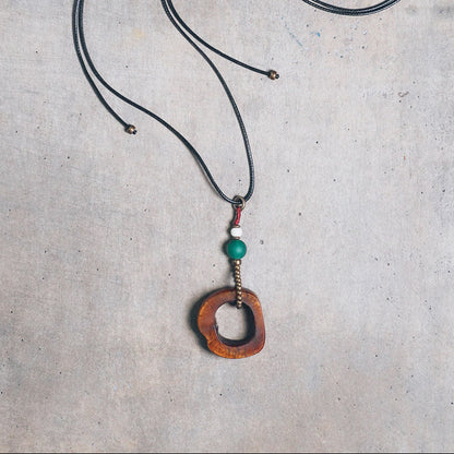 Hand-Carved Tibetan Ox Bone & Green Agate Spiritual Necklace