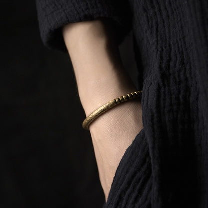 Hand-Hammered Brass Feng Shui Bracelet for Balance & Resilience