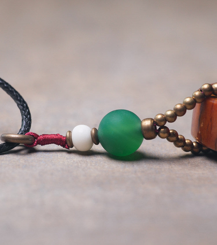 Hand-Carved Tibetan Ox Bone & Green Agate Spiritual Necklace