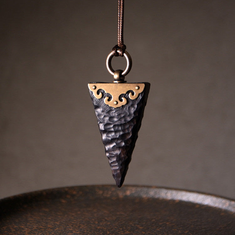 Hand-Carved Ebony Arrowhead and Filigree Brass Necklace