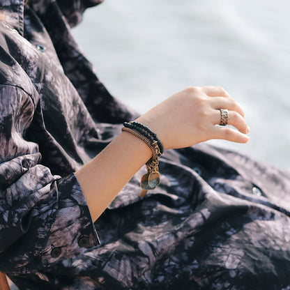 Unisex Lava Stone & Brass Coil Bracelet - Strength & Confidence