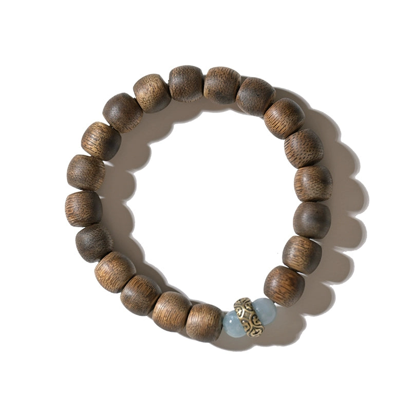 Hand-carved Wooden Bead Bracelet with Buddha Accent - A Path to Balance and Peace