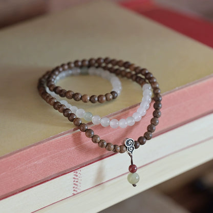 Golden Sandalwood & Jade Buddha Beads Mala for Spiritual Growth