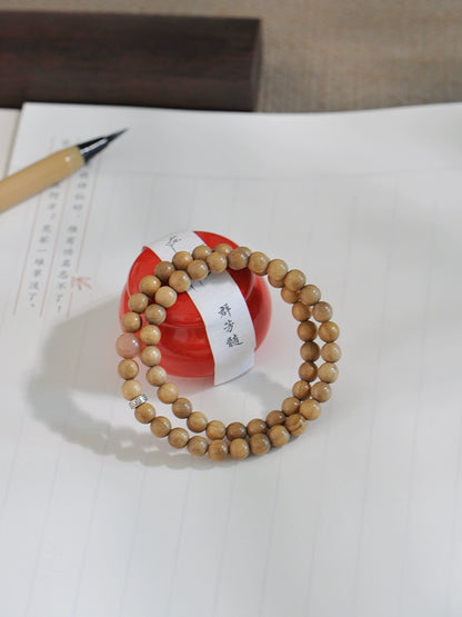 Papuan Sandalwood & Sunstone Mala for Peace, Meditation & Spiritual Growth