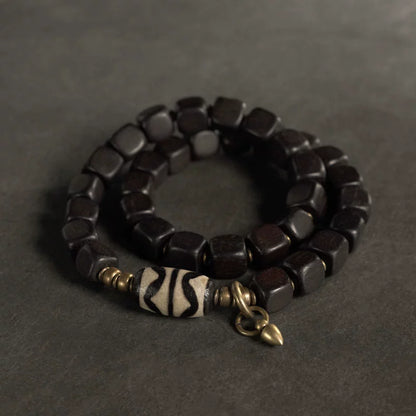 Double Tiger-Tooth Dzi & Ebony Bracelet for Protection & Royal Energy