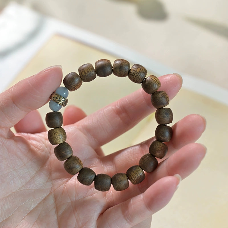 Hand-carved Wooden Bead Bracelet with Buddha Accent - A Path to Balance and Peace
